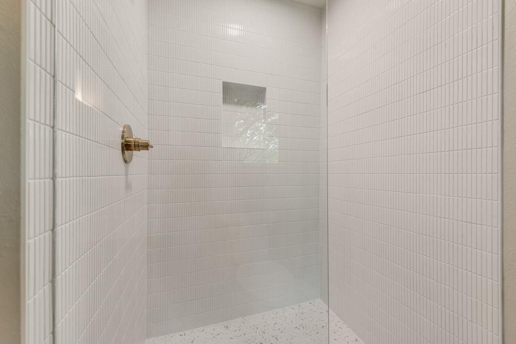 13427 Purple Sage Road Dallas, TX 75240 - Photo 21 of 31 a bathroom with a shower