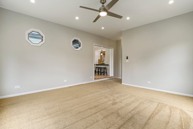 309 East Avenue Park Ridge, IL 60068 - Photo 15 of 32 an empty room with a empty space and windows