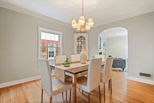 309 East Avenue Park Ridge, IL 60068 - Photo 7 of 32 a view of a dining room with furniture and wooden floor