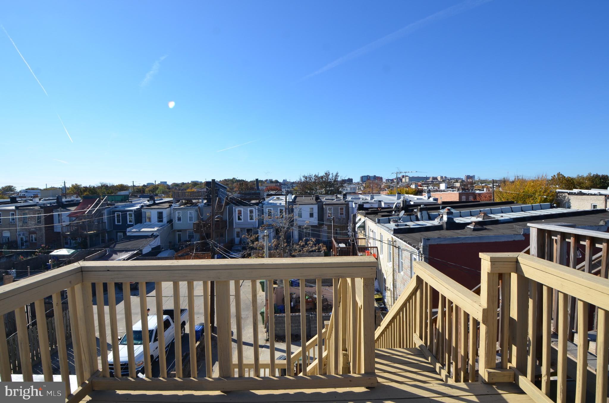 26 North E Avenue Baltimore, MD 21224 - Photo 20 of 22 a view of a balcony with city view