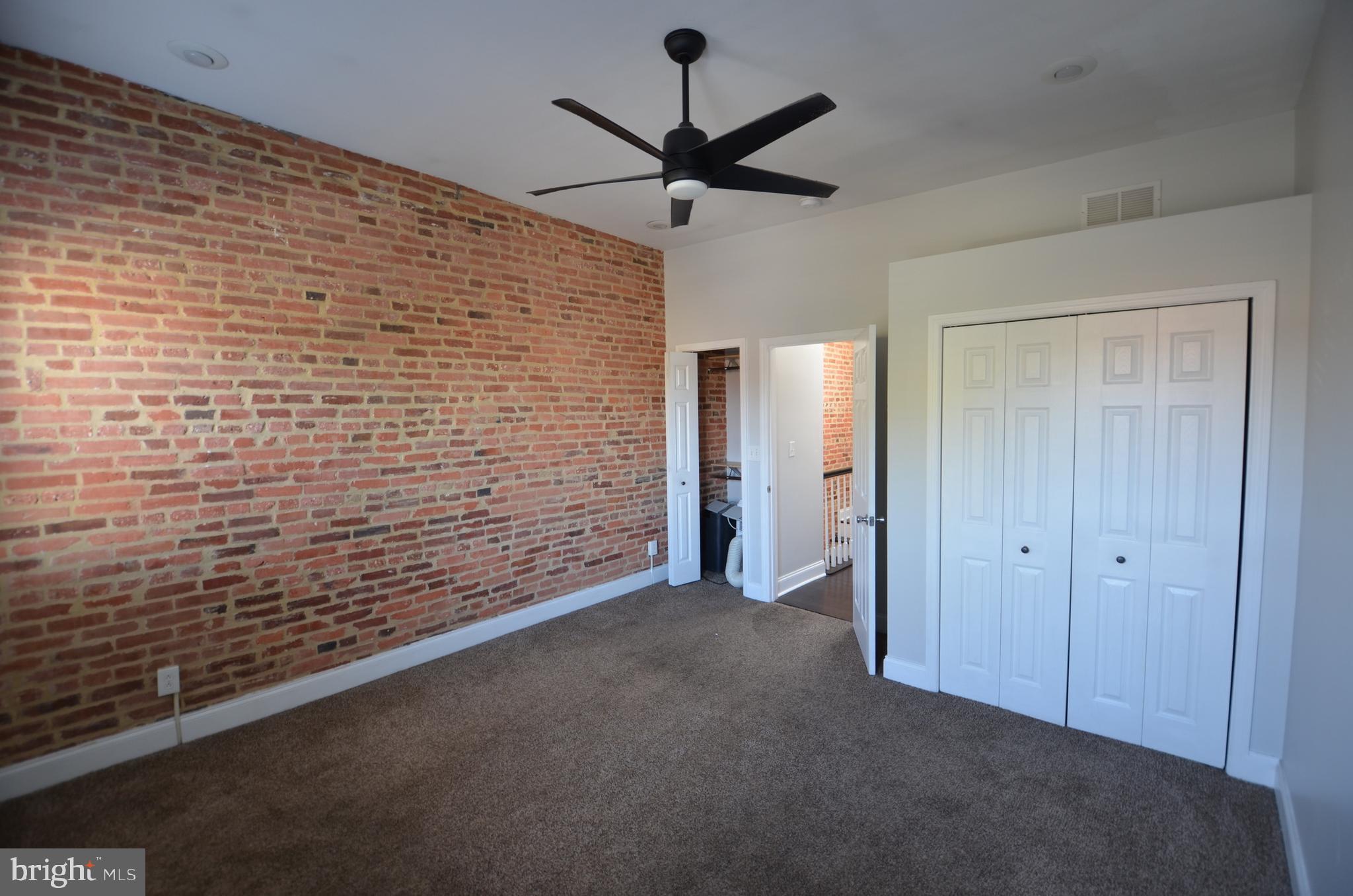 26 North E Avenue Baltimore, MD 21224 - Photo 7 of 22 a view of livingroom with a ceiling fan