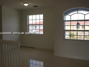 15650 Southwest 11th Terrace Miami, FL 33194 - Photo 7 of 10 an empty room with a window