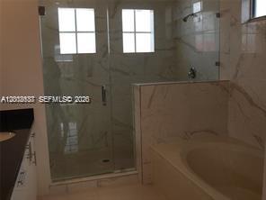 15650 Southwest 11th Terrace Miami, FL 33194 - Photo 9 of 10 a bathroom with a bathtub