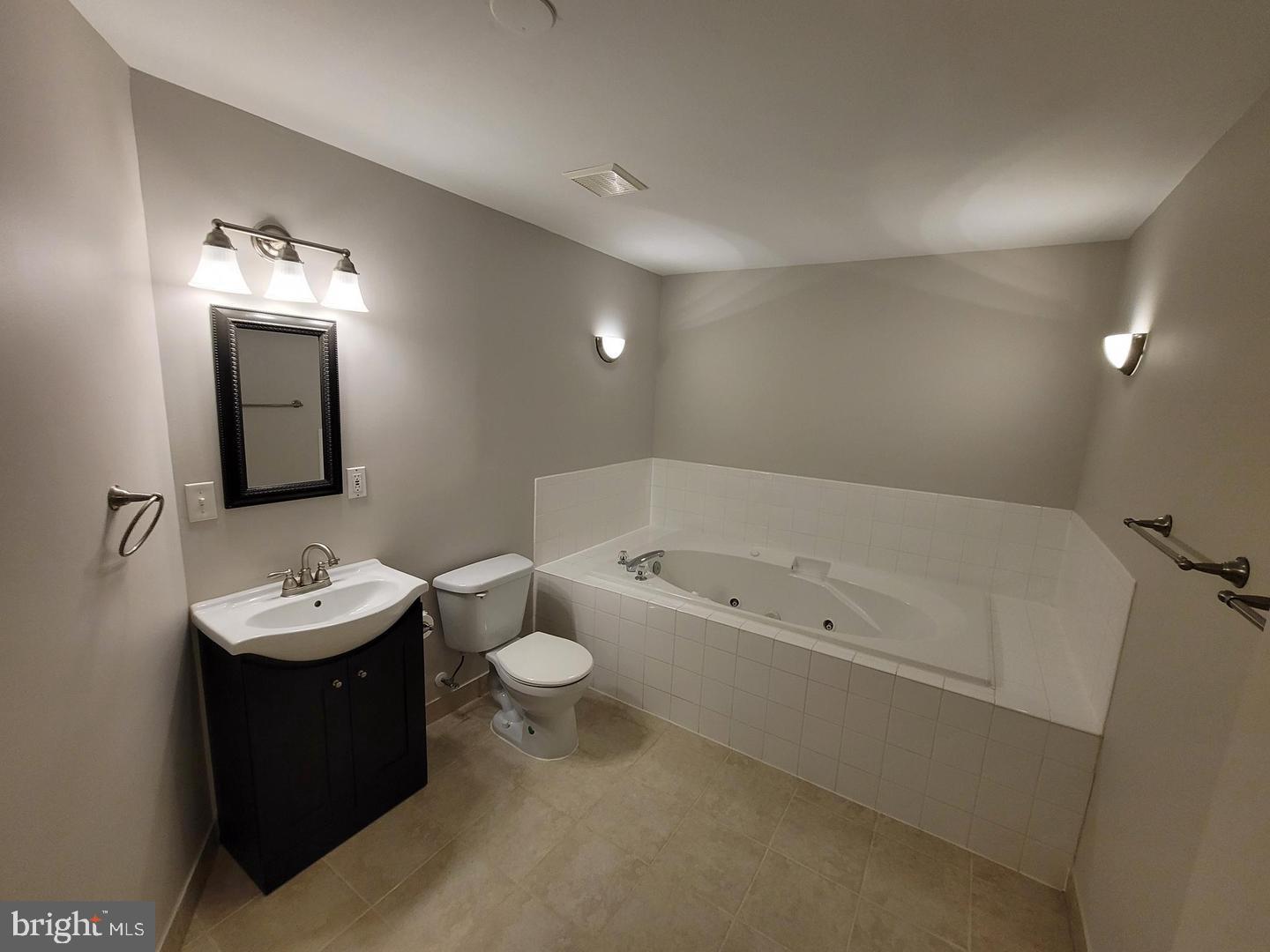 4788 Pearson Drive Woodbridge, VA 22193 - Photo 11 of 23 a bathroom with a sink double vanity and a mirror