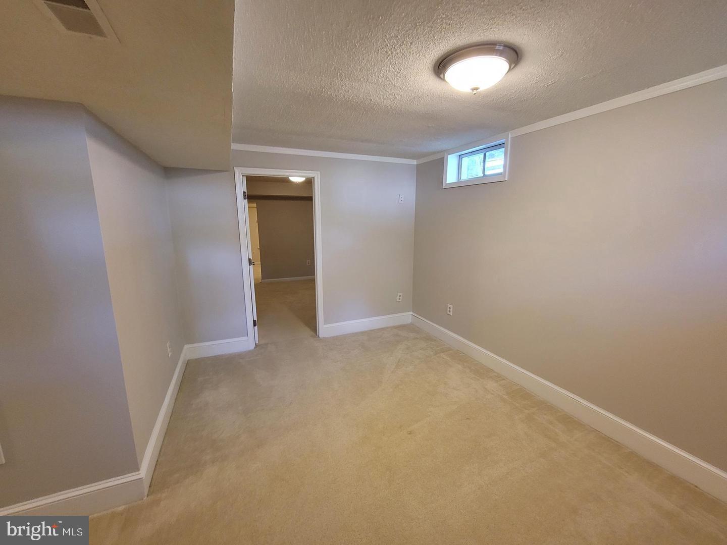 4788 Pearson Drive Woodbridge, VA 22193 - Photo 19 of 23 an empty room with a natural light