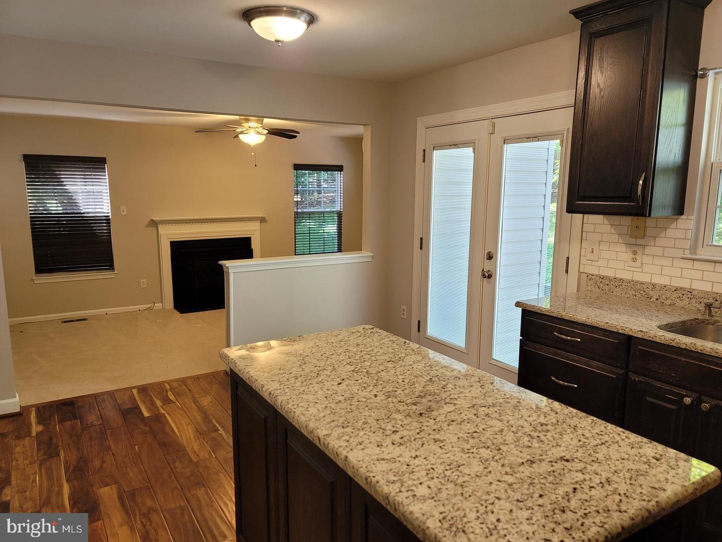 4788 Pearson Drive Woodbridge, VA 22193 - Photo 7 of 23 a kitchen with a stove and a wooden floor