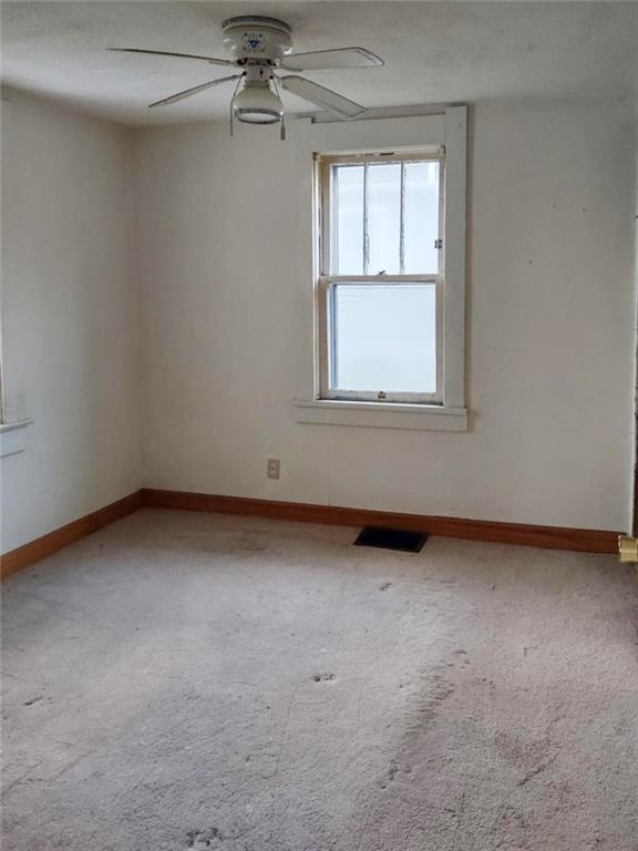3009 Old Pittsburgh Road New Castle, PA 16101 - Photo 4 of 8 an empty room with a window
