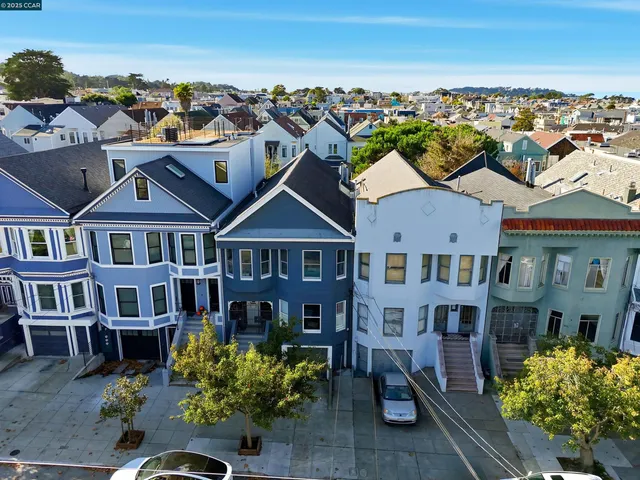 a view of a city with lawn chairs