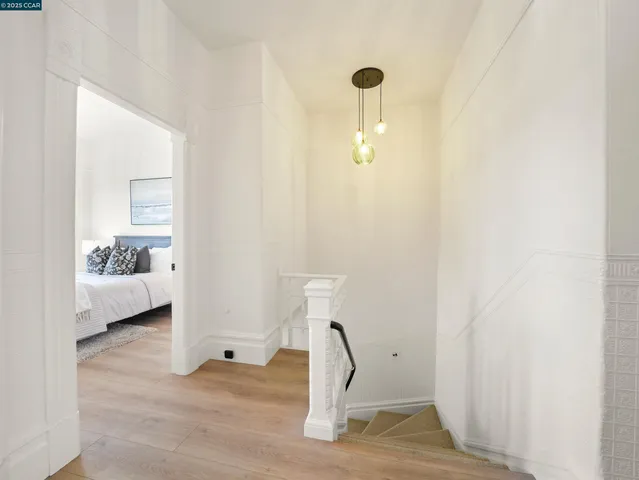 a view of a livingroom with table and a chair