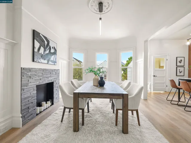a view of a livingroom with furniture and a fireplace