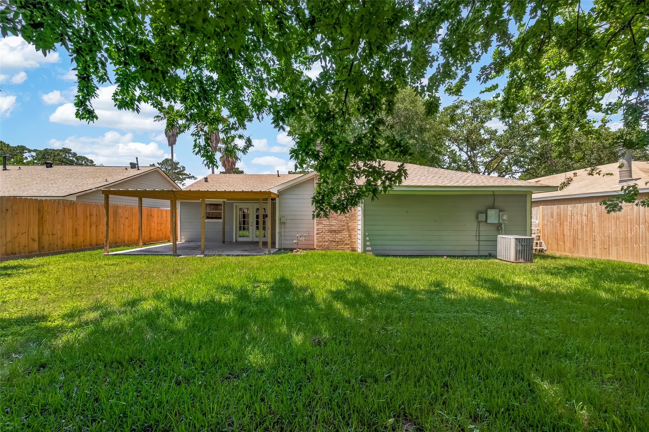 24006 Lone Elm Drive Spring, TX 77373 - Photo 23 of 25 Large trees line the back of the yard
