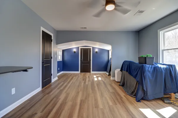 a bathroom with a sink a toilet and bathtub