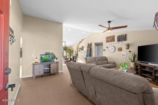 552 Spur Court Fernley, NV 89408 - Photo 6 of 46 a living room with furniture and a flat screen tv