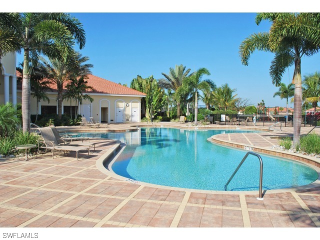 19612 Tesoro Way Fort Myers, FL 33967 - Photo 13 of 14 a view of a swimming pool with an outdoor seating