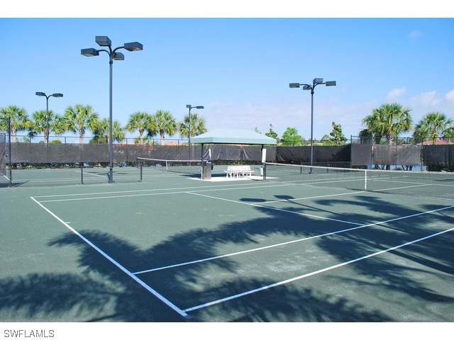 19612 Tesoro Way Fort Myers, FL 33967 - Photo 14 of 14 a view of a tennis court