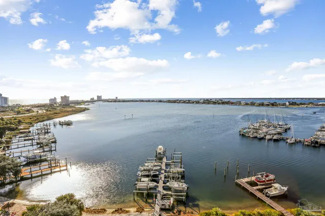 a view of a balcony with wooden floor