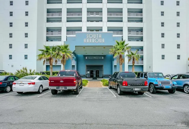 a view of a swimming pool with a lounge chairs