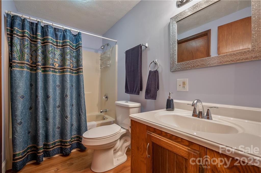 481 Plantation Drive Rutherfordton, NC 28139 - Photo 13 of 48 a bathroom with a sink a toilet and shower