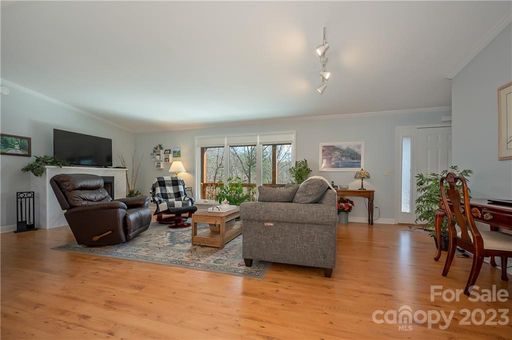 481 Plantation Drive Rutherfordton, NC 28139 - Photo 16 of 48 a living room with furniture and a flat screen tv