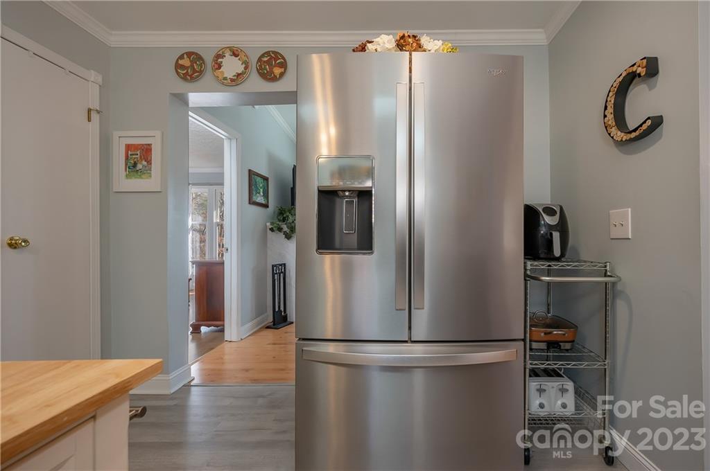 481 Plantation Drive Rutherfordton, NC 28139 - Photo 21 of 48 a kitchen with stainless steel appliances granite countertop a refrigerator and a sink