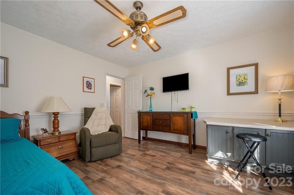481 Plantation Drive Rutherfordton, NC 28139 - Photo 26 of 48 a living room with furniture and a flat screen tv