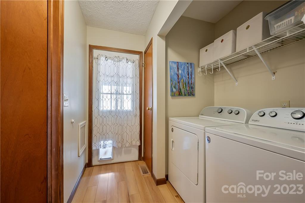 481 Plantation Drive Rutherfordton, NC 28139 - Photo 27 of 48 a view of utility room with washer and dryer