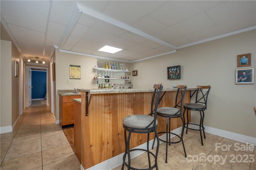 481 Plantation Drive Rutherfordton, NC 28139 - Photo 32 of 48 a dinning room dining room with furniture and a kitchen view