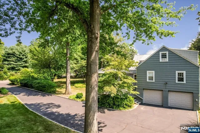 a house view with a backyard space