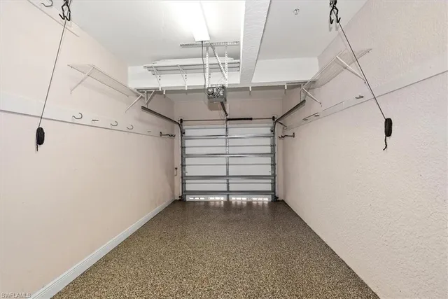 a view of swimming pool is middle in the garden