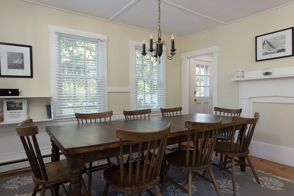 316 Lower County Road Harwich, MA 02646 - Photo 8 of 29 a view of a dining room with furniture and window