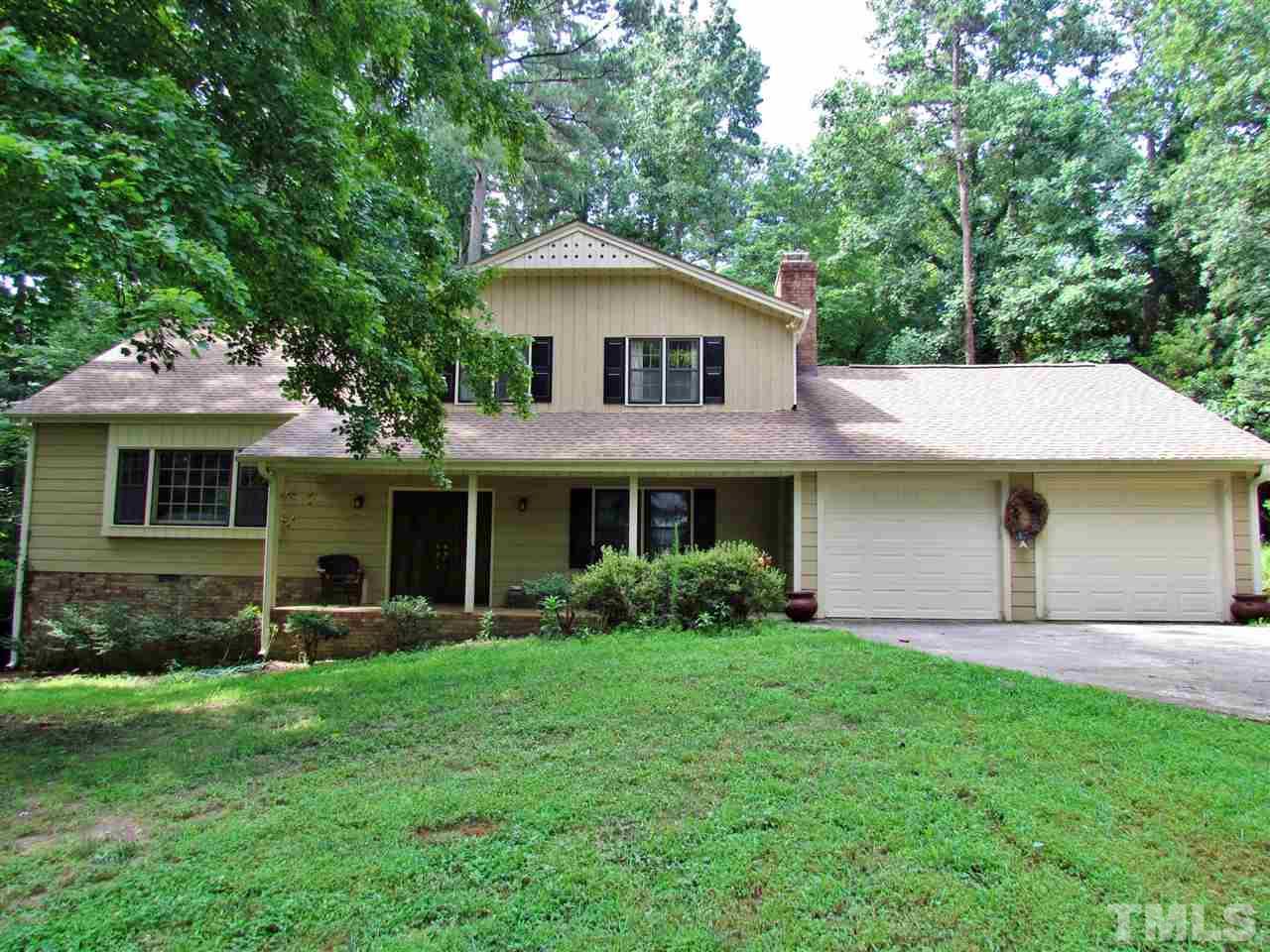 212 Dunstable Court Raleigh, NC 27614 - Photo 1 of 25 a aerial view of a house with a yard and potted plants