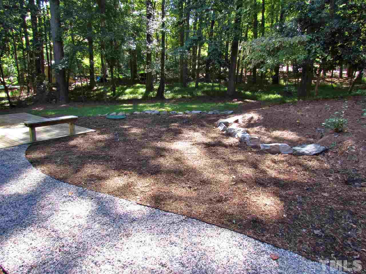 212 Dunstable Court Raleigh, NC 27614 - Photo 22 of 25 a view of a park with tree s