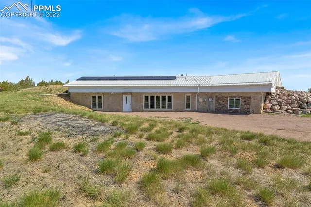 a house view with a garden space