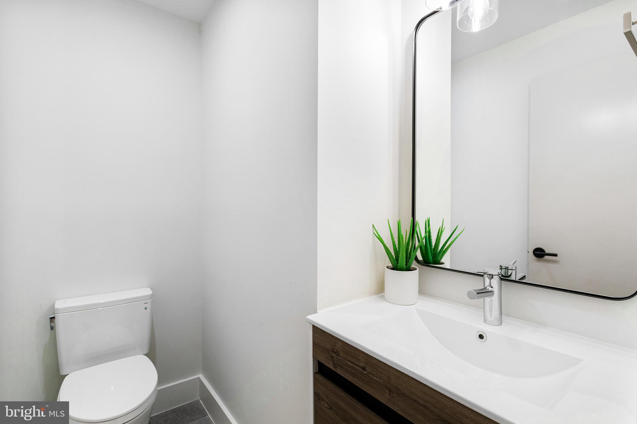 3933 14th Street Northwest, Unit 2 Washington, DC 20011 - Photo 17 of 29 Half bathroom off of living room