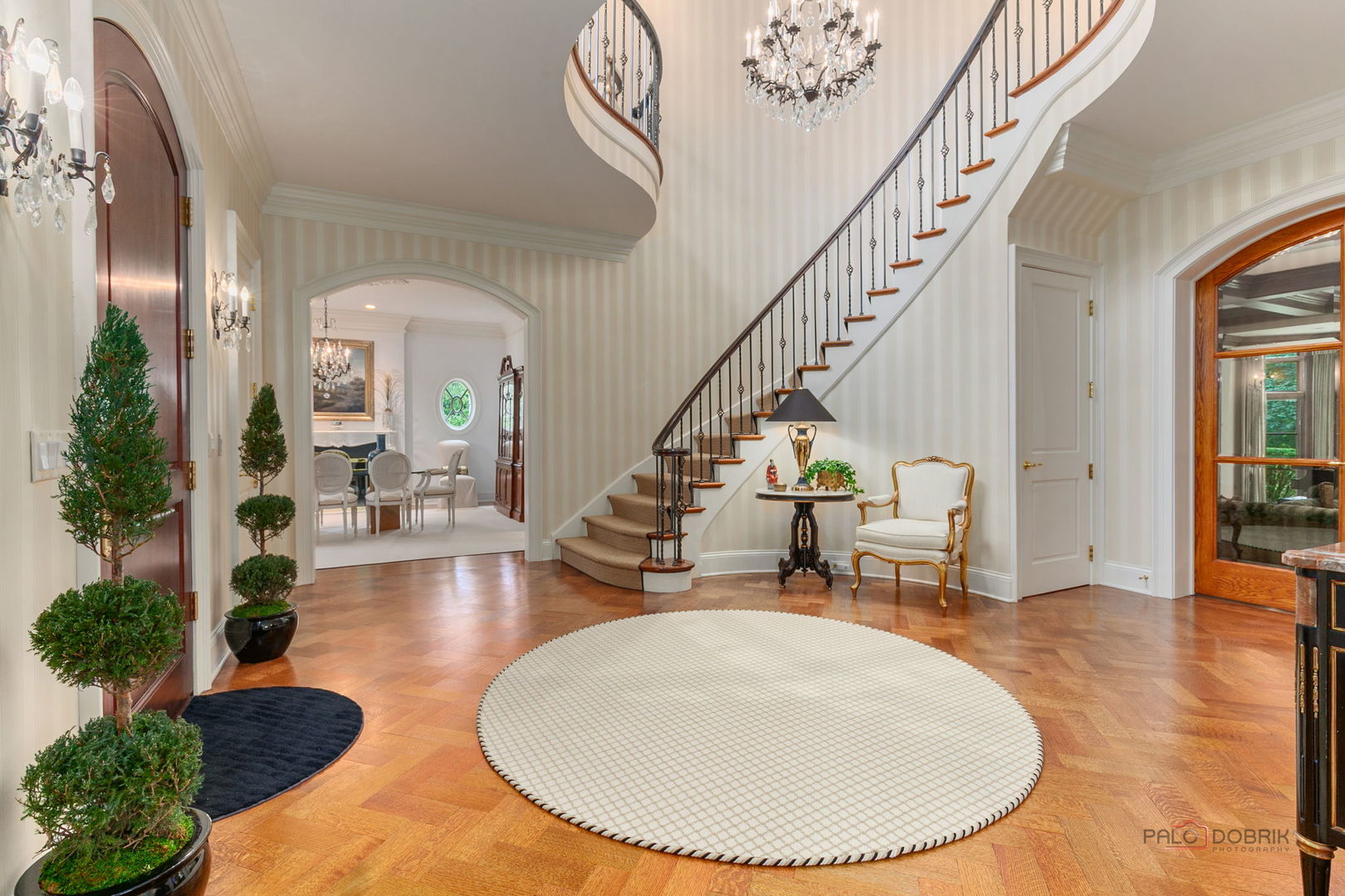 1271 North Green Bay Road Lake Forest, IL 60045 - Photo 12 of 57 an entryway with wooden floor and a potted plant
