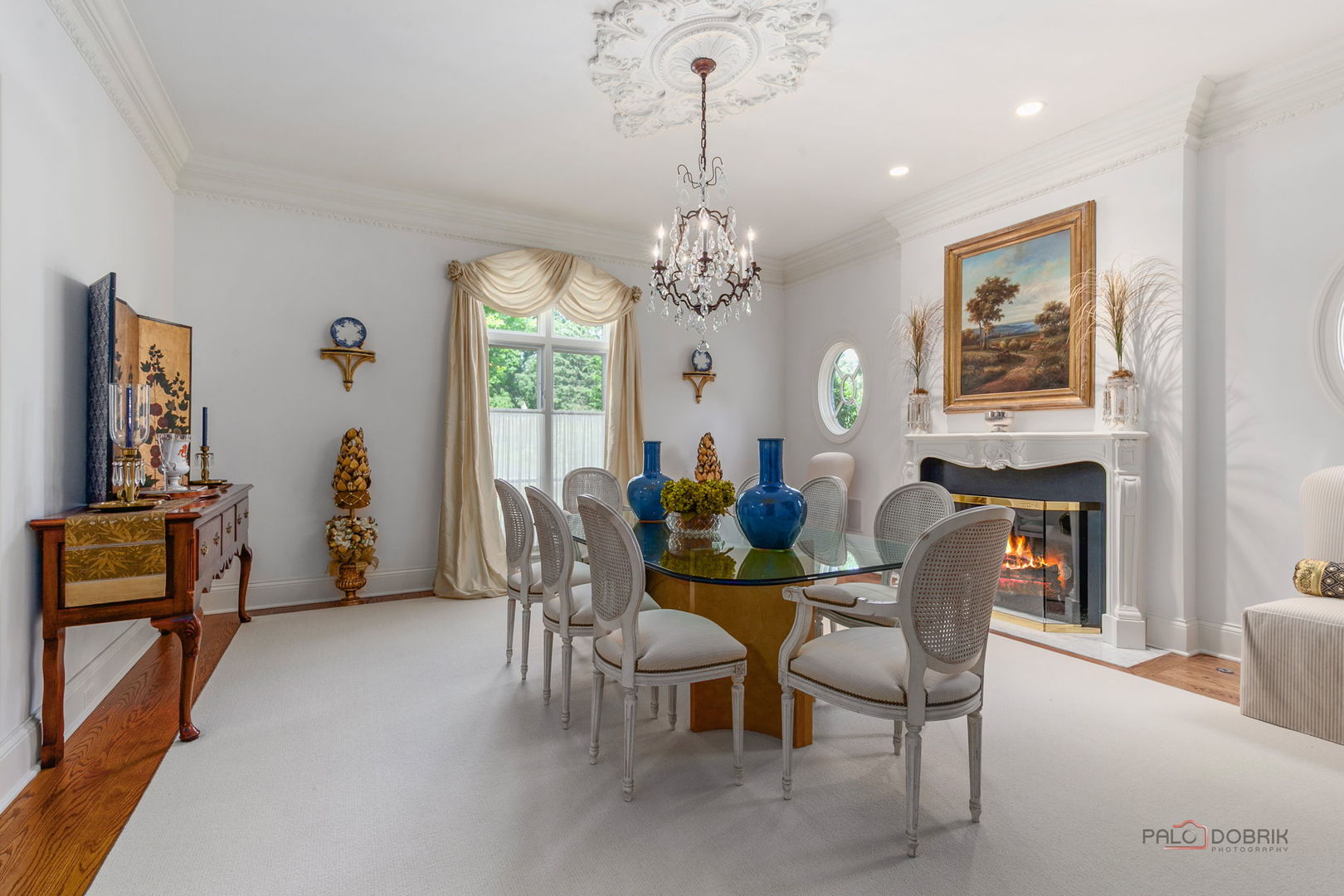 1271 North Green Bay Road Lake Forest, IL 60045 - Photo 14 of 57 a view of a dining room with furniture and a chandelier