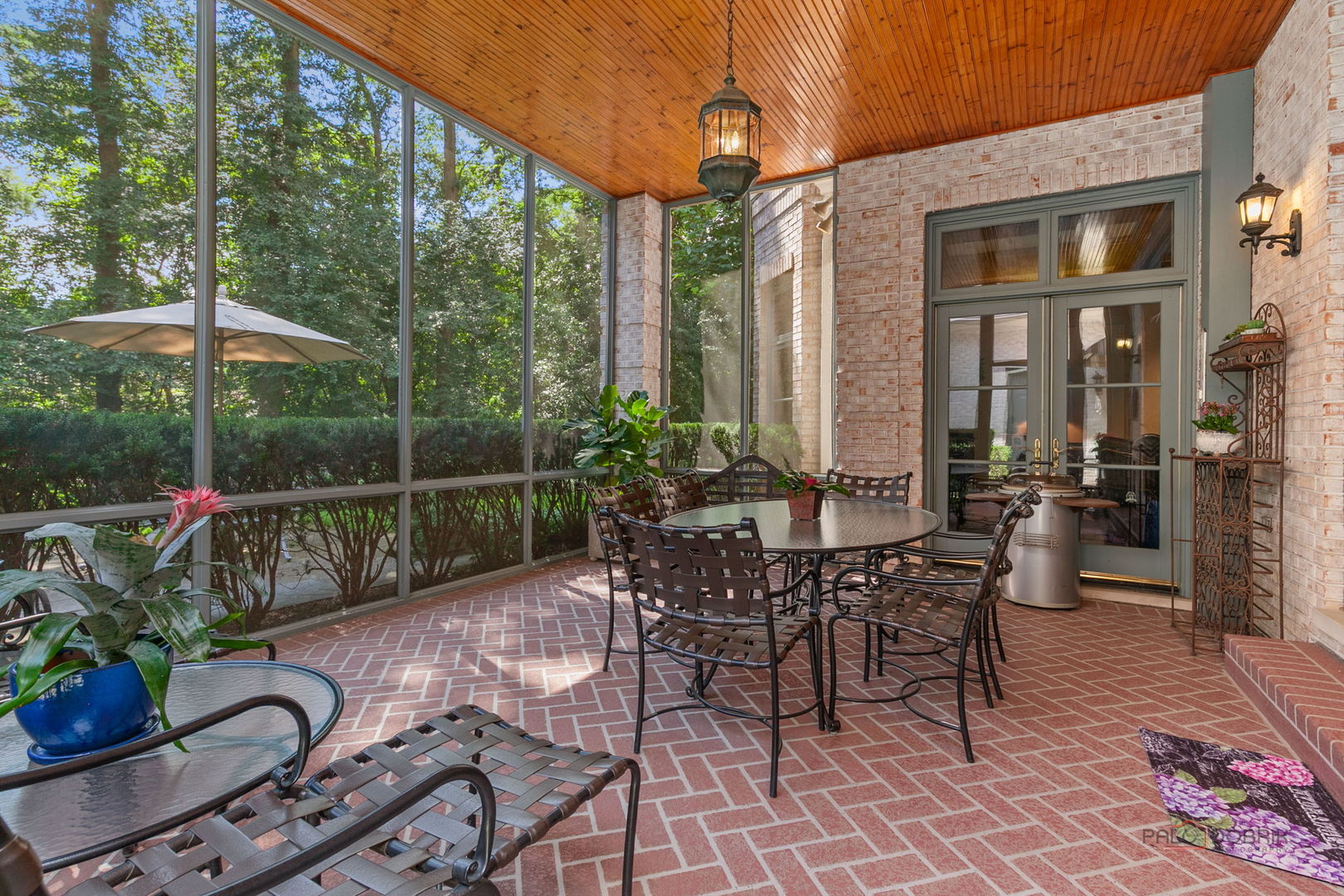 1271 North Green Bay Road Lake Forest, IL 60045 - Photo 21 of 57 a view of a patio with a dining table and chairs