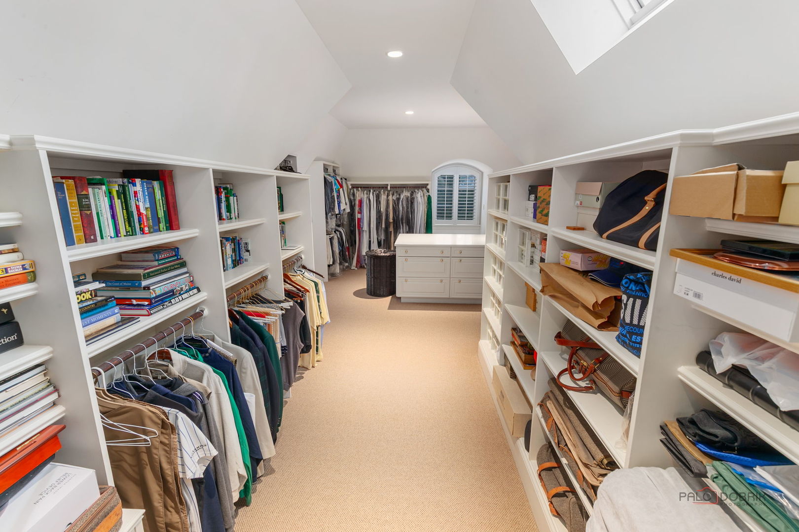 1271 North Green Bay Road Lake Forest, IL 60045 - Photo 35 of 57 a view of walk in closet with clothes and shoes