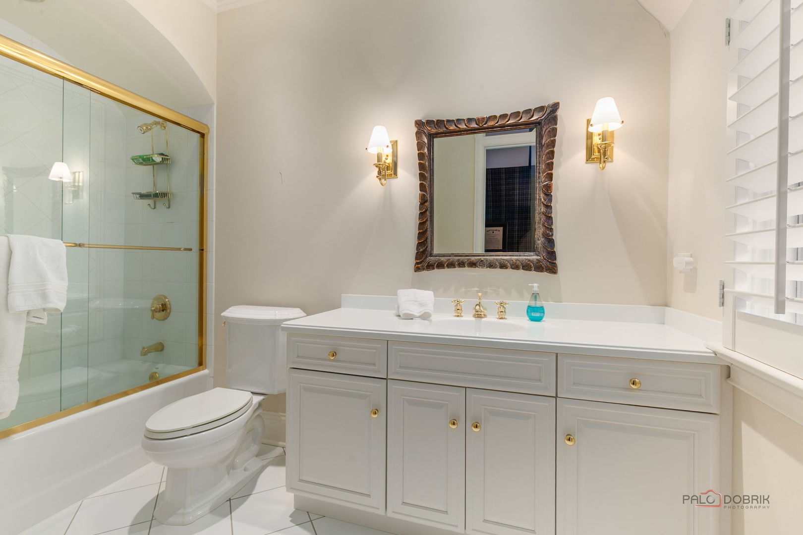 1271 North Green Bay Road Lake Forest, IL 60045 - Photo 40 of 57 a bathroom with a toilet a sink a mirror a shower and vanity