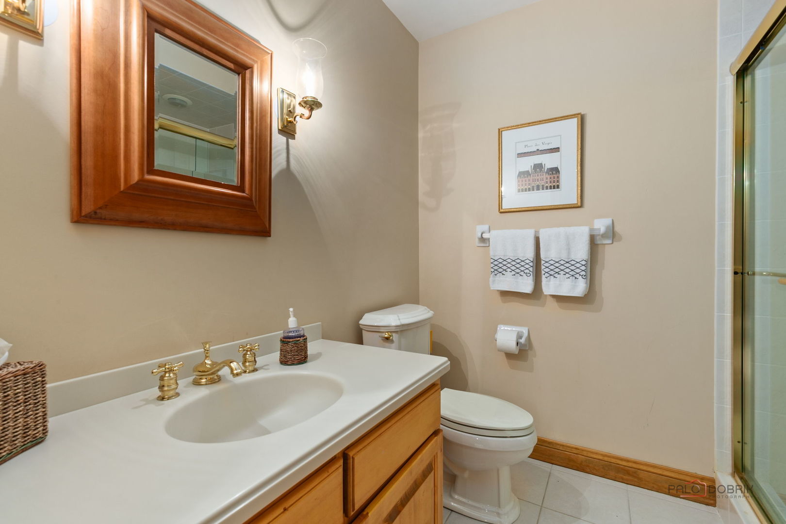1271 North Green Bay Road Lake Forest, IL 60045 - Photo 48 of 57 a bathroom with a toilet sink and mirror