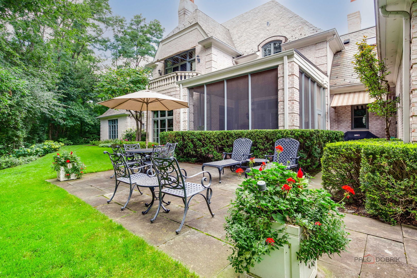 1271 North Green Bay Road Lake Forest, IL 60045 - Photo 49 of 57 a view of a patio with table and chairs and potted plants