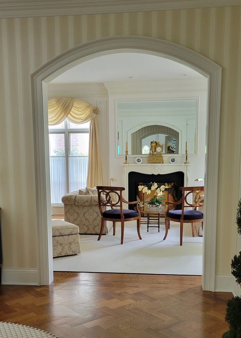 1271 North Green Bay Road Lake Forest, IL 60045 - Photo 6 of 57 a living room with furniture and a fireplace