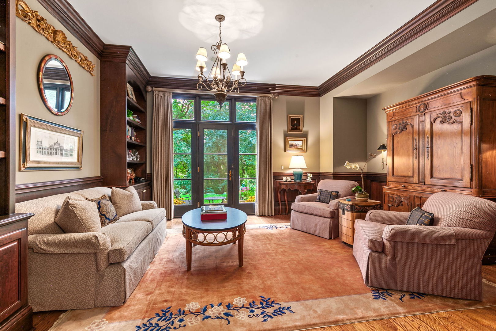 1271 North Green Bay Road Lake Forest, IL 60045 - Photo 9 of 57 a living room with furniture and a chandelier