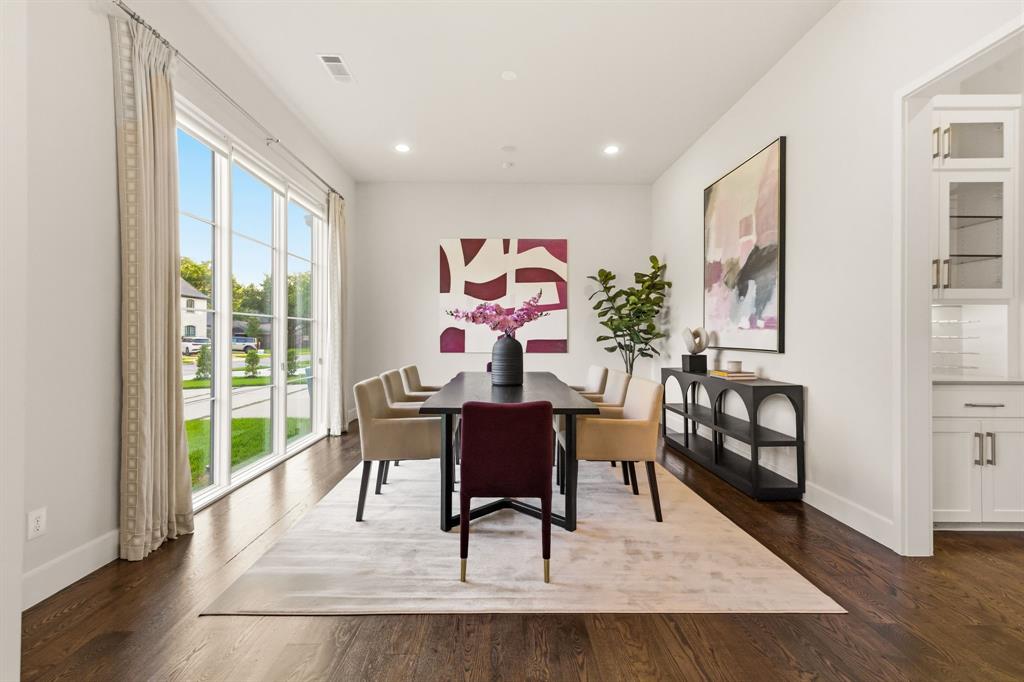 6523 Northwood Road Dallas, TX 75225 - Photo 5 of 36 a view of a dining room with furniture window and wooden floor