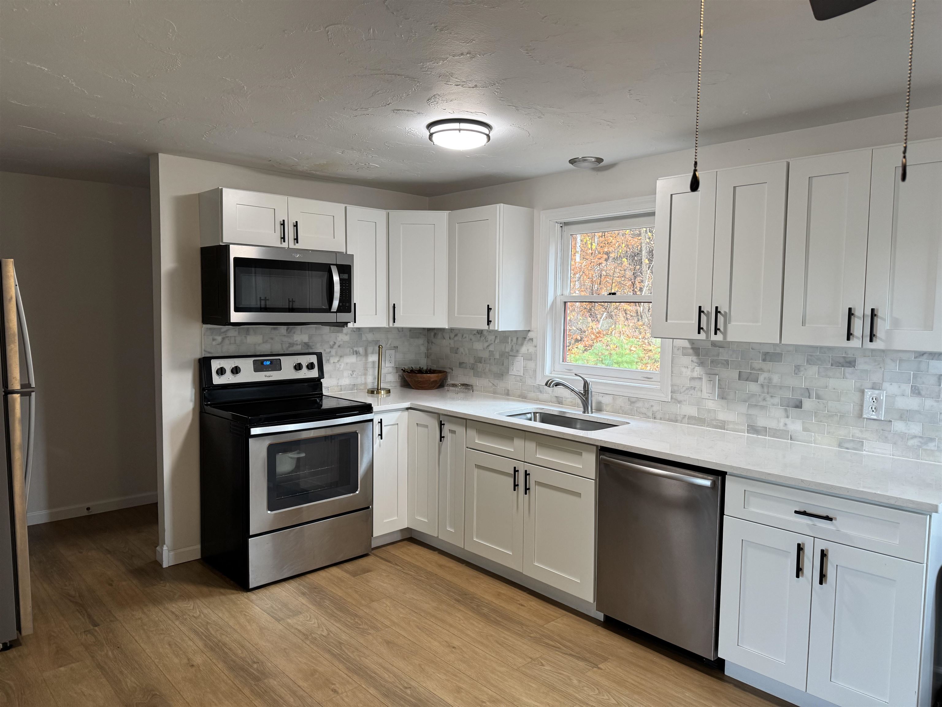 147 Weirs Boulevard, Unit 7 Laconia, NH 03246 - Photo 7 of 36