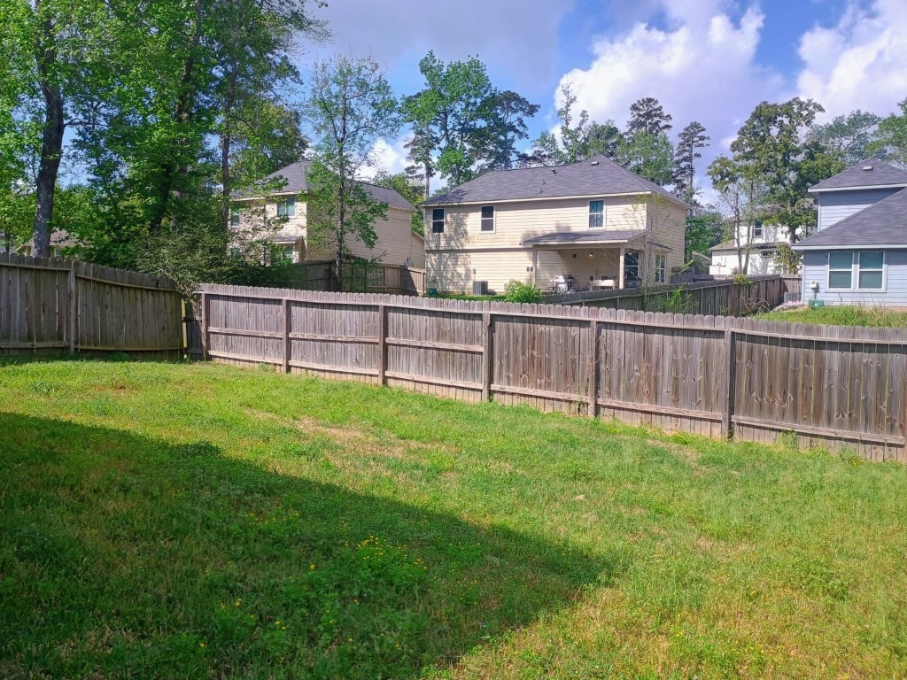 14945 Austin Road Willis, TX 77378 - Photo 13 of 13 backyard