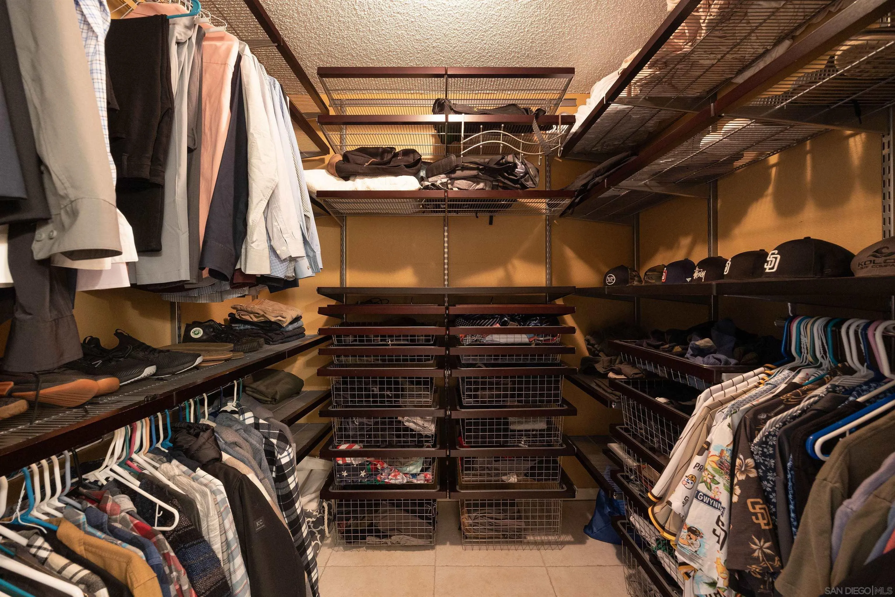 7700 Parkway Drive, Unit 4 La Mesa, CA 91942 - Photo 14 of 23 a close up view of walk in closet