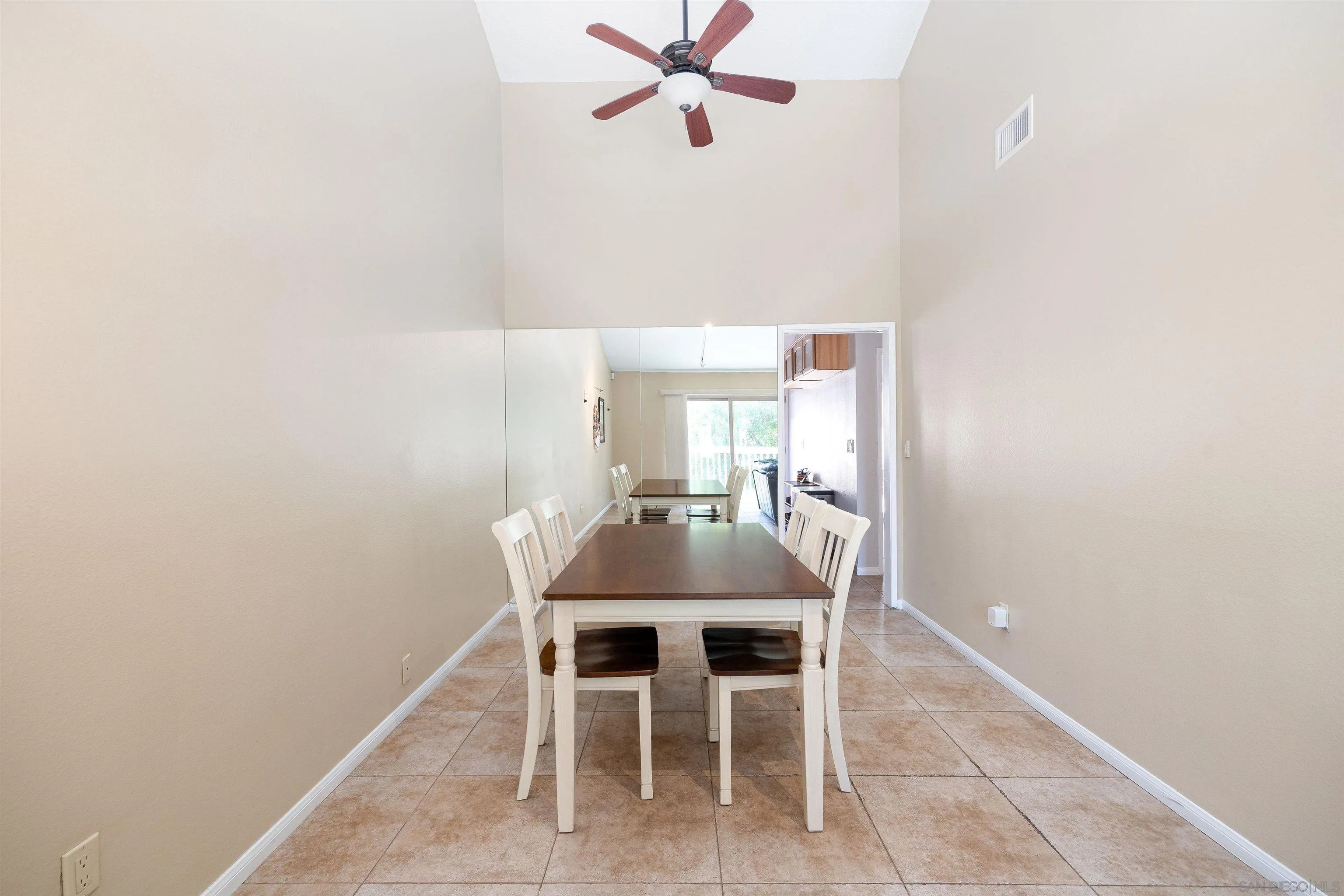7700 Parkway Drive, Unit 4 La Mesa, CA 91942 - Photo 9 of 23 a dining room with furniture and a window