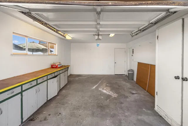 a view of a hallway with stairs
