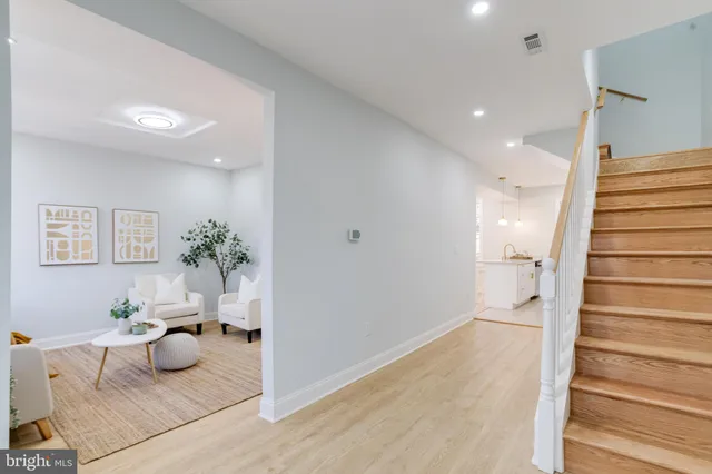 a living room with furniture and a couch